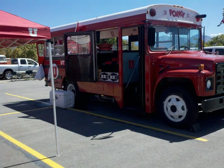 Porky parked in the lot with a canopy set up alongside